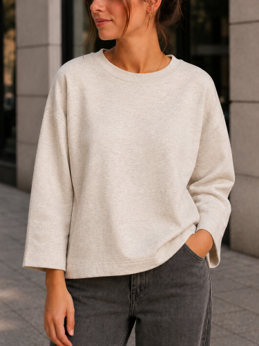 Bluza z rękawem 7/8 w kolorze jasnobeżowego melanżu, widok z przodu